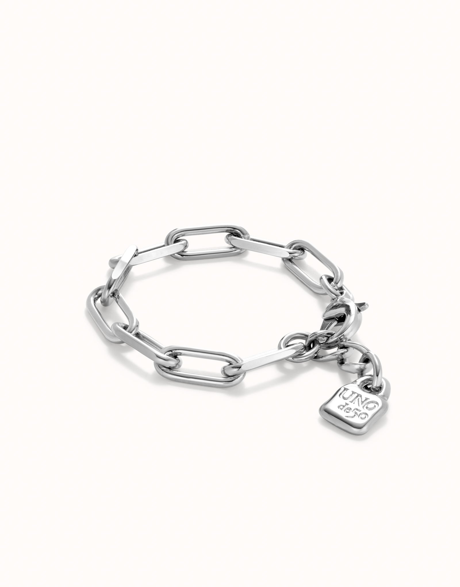 Sterling silver bracelet with oversized oval chain links and a rectangular "KING ICE" padlock charm, polished finish. Available in multiple sizes.