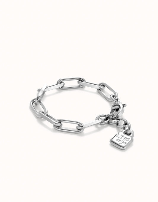 Sterling silver bracelet with oversized oval chain links and a rectangular "KING ICE" padlock charm, polished finish. Available in multiple sizes.