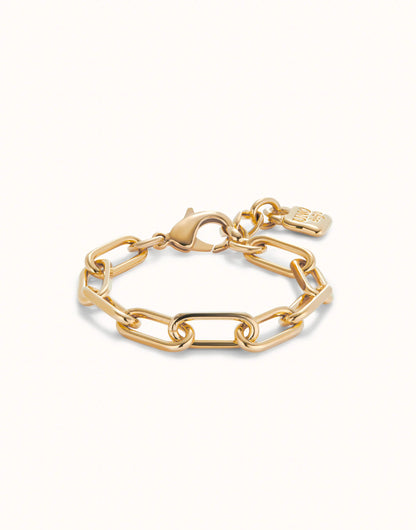 Gold Paper Clip Link Bracelet with Padlock features large rectangular links, a lobster clasp, and a small engraved tag. 18K gold-plated, handmade; available in 6", 7", and 8" sizes.
