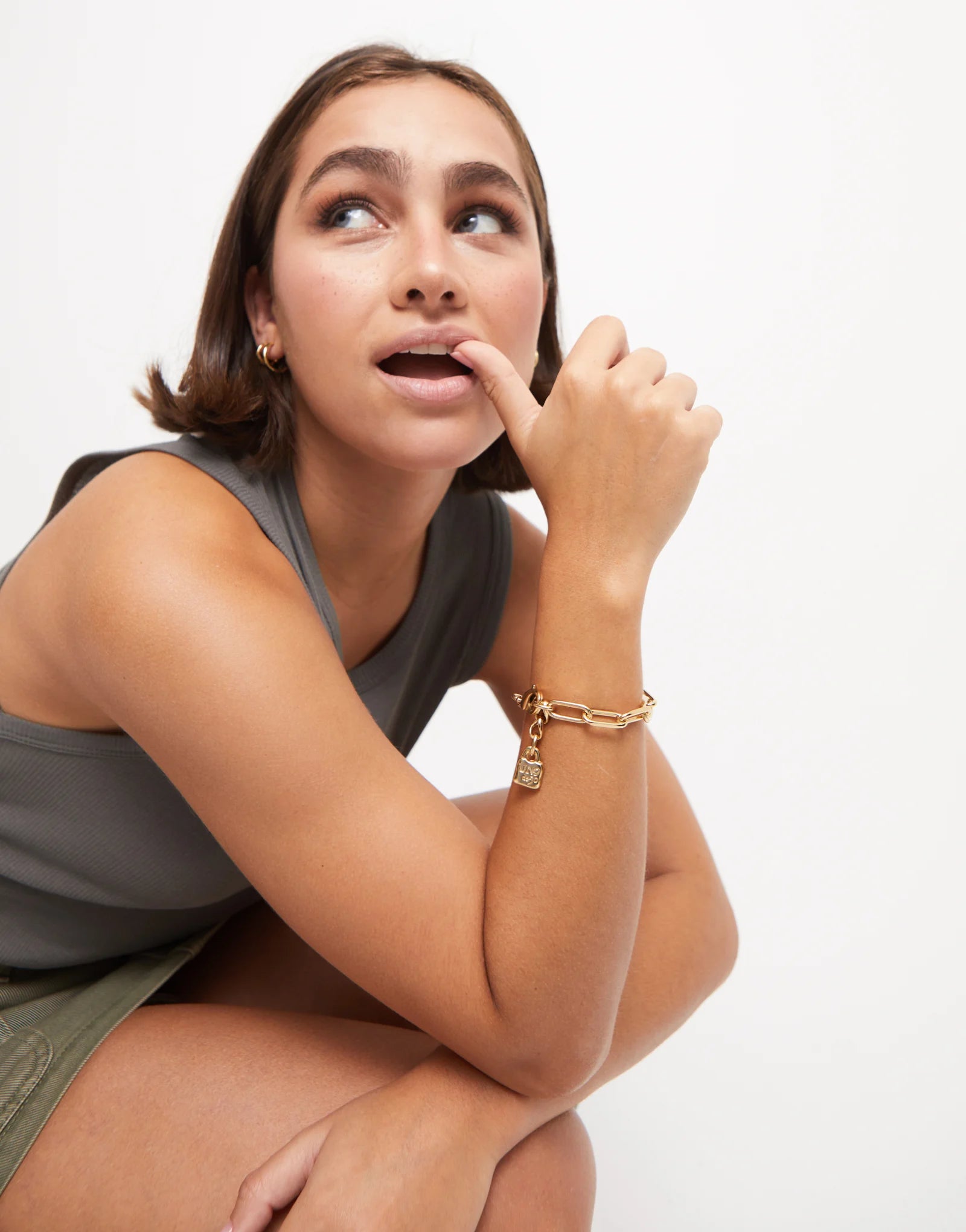 Gold Paper Clip Link Bracelet with Padlock shown; available in S, M, and L sizes.