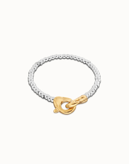 Two-tone beaded bracelet with silver-plated design and gold carabiner clasp; available in multiple sizes.
