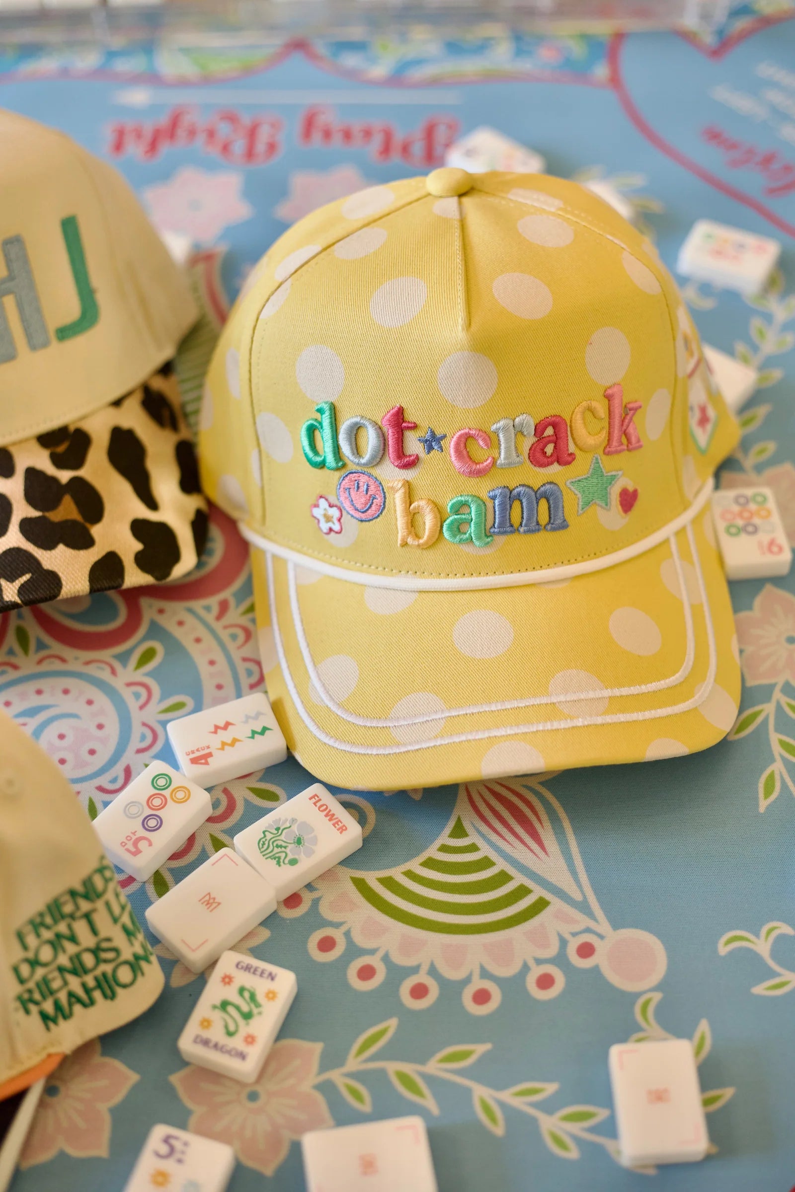 Yellow and white polka dot snapback with "dot crack bam" embroidery. Available in S, M, L.