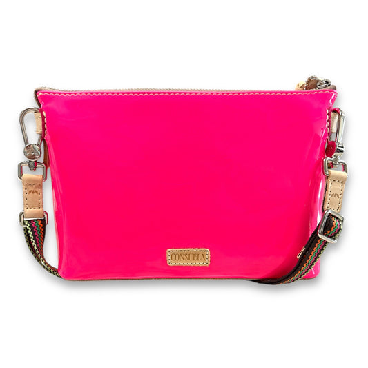 Bright pink patent leather crossbody with embroidery, multicolored strap, gold hardware, Consuela logo. Sizes: One size.