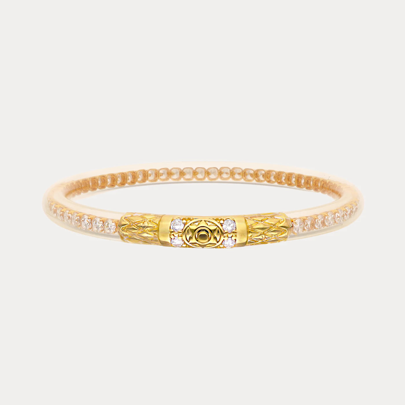 Handcrafted gold bangle with clear crystals and a textured, patterned clasp. Available in S, M, L sizes.