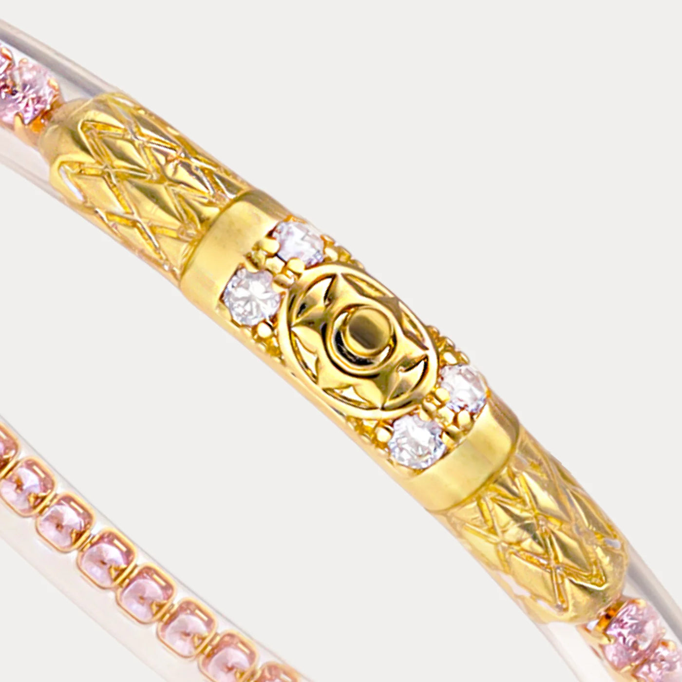 Queen All Weather Bangles® in Petal Pink & Gold with patterns, pink and white stones, engraved oval center. Sizes: S, M, L.