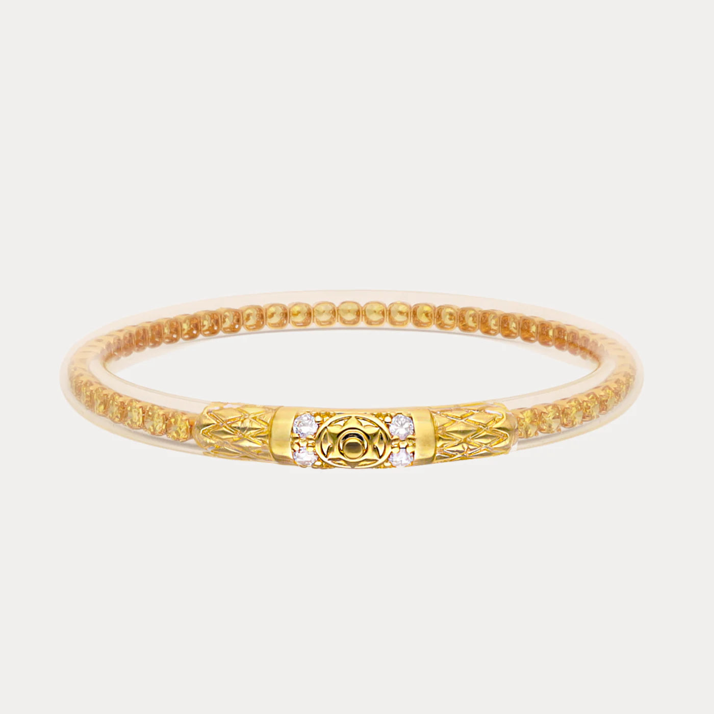 Gold-toned beaded bracelet with ornate central clasp, small gemstones. Available sizes: S, M, L.