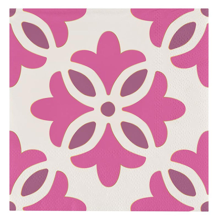 The Ceramic Napkin Tray + Napkins Set includes a tray featuring pink and purple floral shapes with white accents on a cream background. Available sizes: One size.