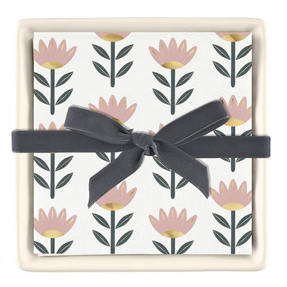 Set of pink and green floral paper cocktail napkins in an off-white ceramic tray; standard size napkins.