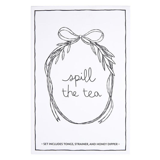 The "Tea Essential Book Box - Spill The Tea" is a charming set featuring a tea-themed print with black and white wreath illustration. It includes tea bag tongs, a tea infuser strainer, and a honey dipper. Available sizes: N/A.