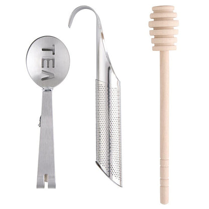 The Tea Essential Book Box - Spill The Tea includes a stainless steel scoop with "TEA" cutout, an infuser strainer with hook, and a wooden honey dipper. Sizes available: standard.