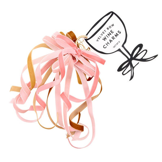 A set of six velvet bow wine charms with pink, peach, and brown ribbons and a black tag labeled "Velvet Bow Wine Charms." Sizes: One size.