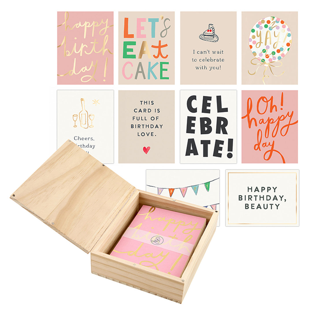 Greeting card set with festive designs and cheerful messages. Sizes available are standard greeting card size.