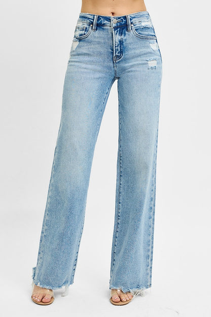 Risen Tummy Control MR Wide Leg Jeans: high-waisted, light wash, raw hem, slight distressing. Sizes: 0-15.