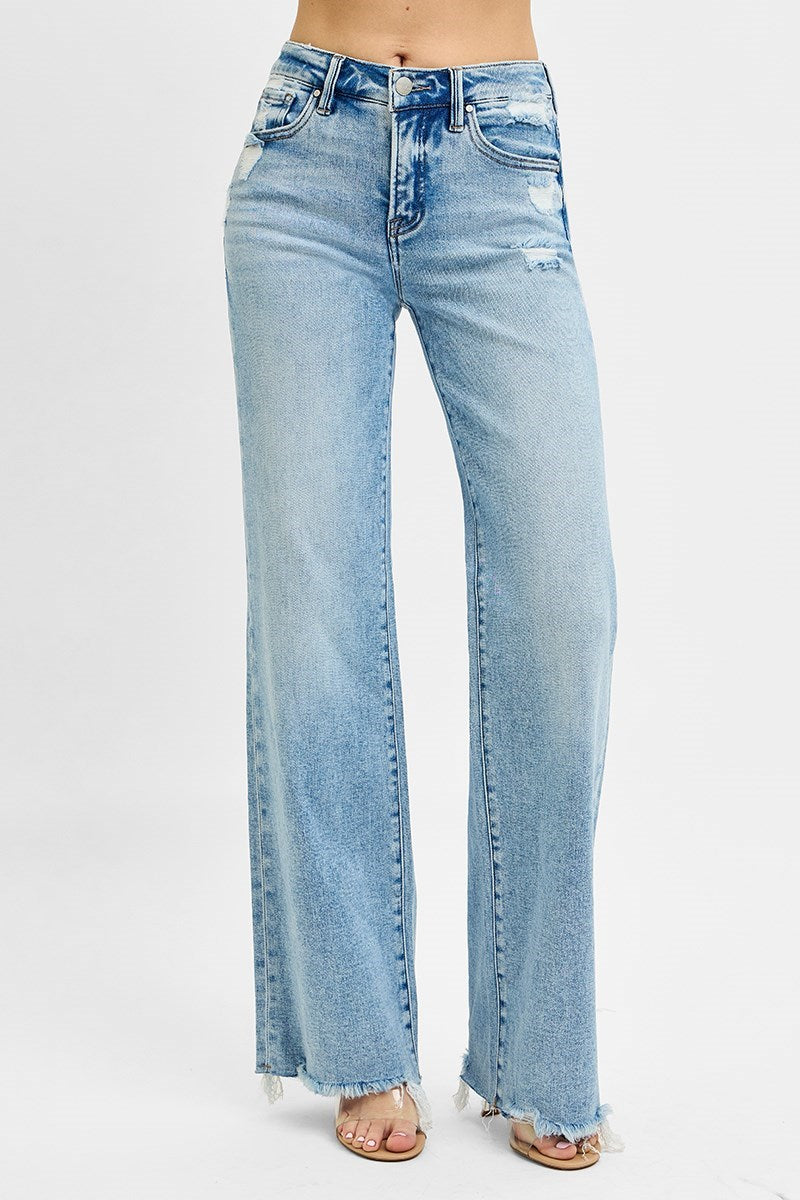 Risen Tummy Control MR Wide Leg Jeans, light wash, distressed details, raw edge hem. Available in sizes S-XL.