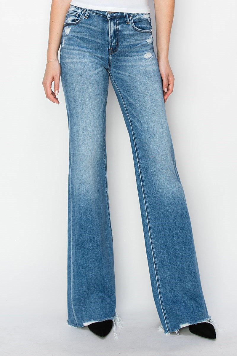 Risen Tummy Control MR Wide Leg Jeans in blue with raw edge hem, slight distressing. Available in sizes S-XL.