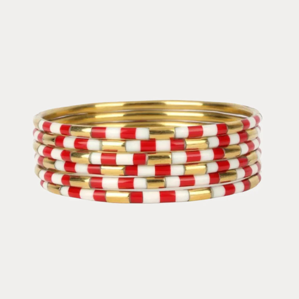 Six BuDhaGirl Red & White Veda Stack enamel bangles in red, white, and gold patterns. Available in S, M, L.