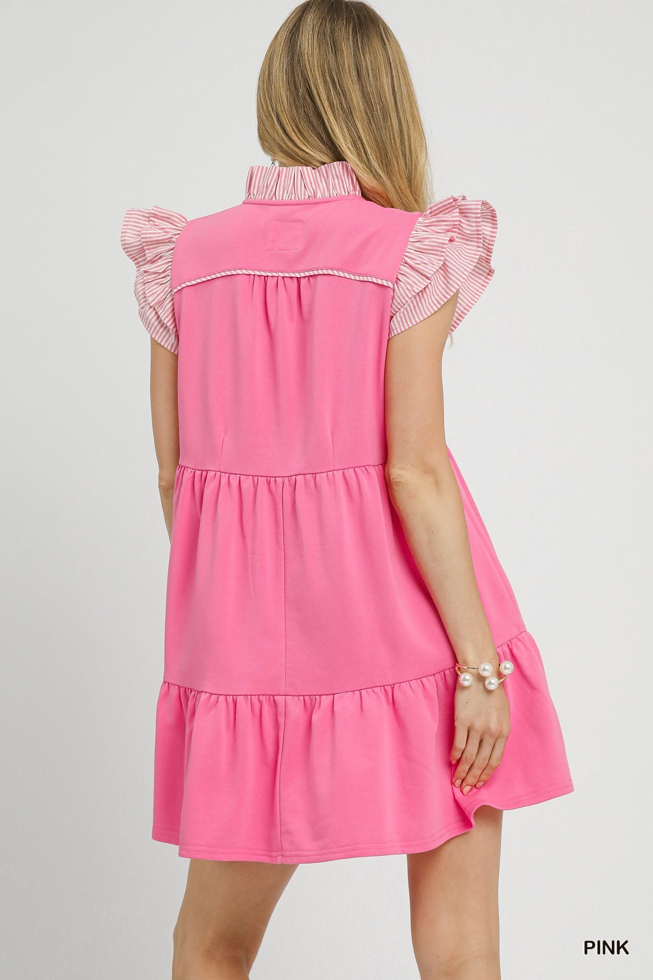 Bubblegum Bliss Ruffle Sleeve Tiered Dress with striped ruffle sleeves and collar. Available in sizes XS-XL.