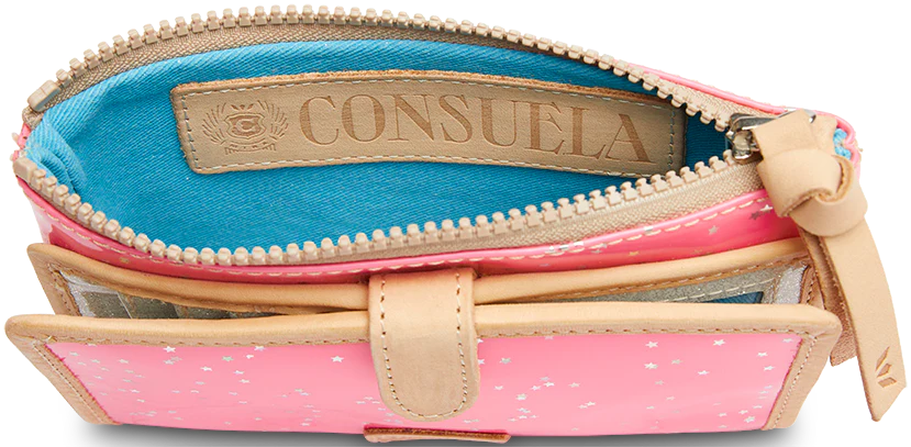 Consuela Slim Wallet, Shine in neon pink patent star glitter. Features a top zipper, blue fabric interior, and visible brand label. Includes front leather pocket and 12 card slots for organization. Available Size: One Size.