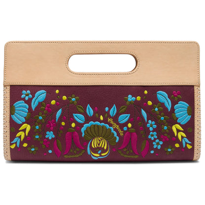 Rectangular maroon clutch with tan leather handle, colorful floral embroidery; available in multiple sizes.