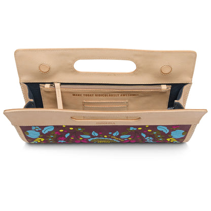 Tan leather clutch with handle cutout, floral embroidered flap, inscribed inner pocket. Available in small and large sizes.