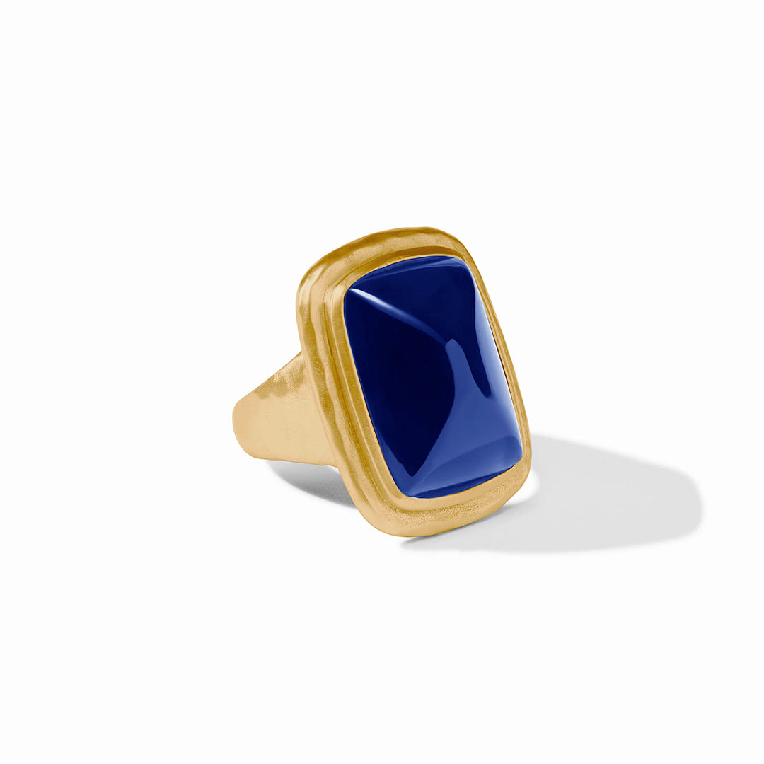 Gold ring with a large, rectangular, faceted iridescent sapphire blue Sahara stone. Sizes available.