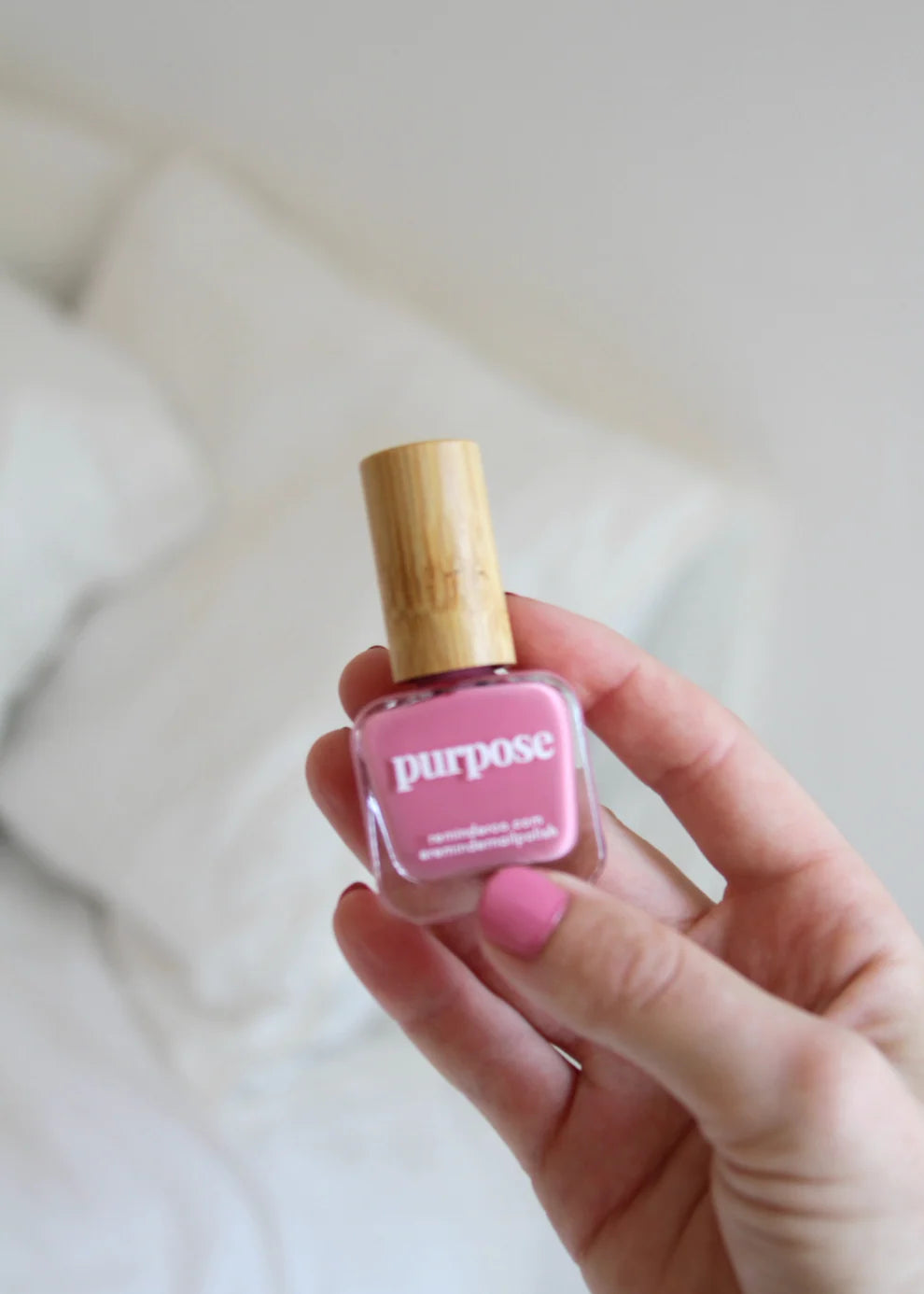 ‘Purpose’ honeysuckle pink reminder nail polish with wooden cap, white label, vegan, cruelty-free. Sizes: 10ml, 15ml.