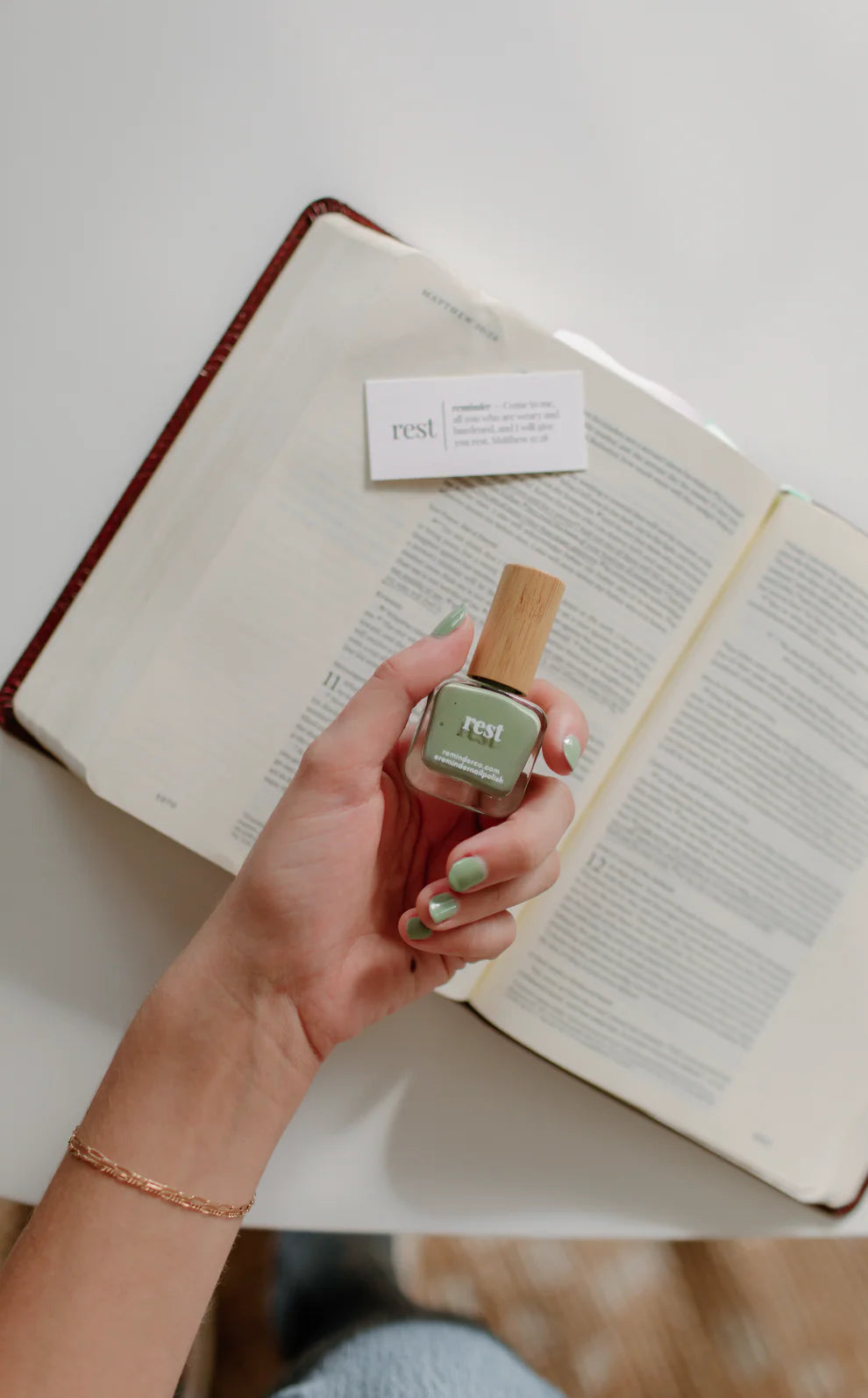 'Sage green "rest" nail polish | reminder' bottle shown; available in 10ml and 15ml sizes.
