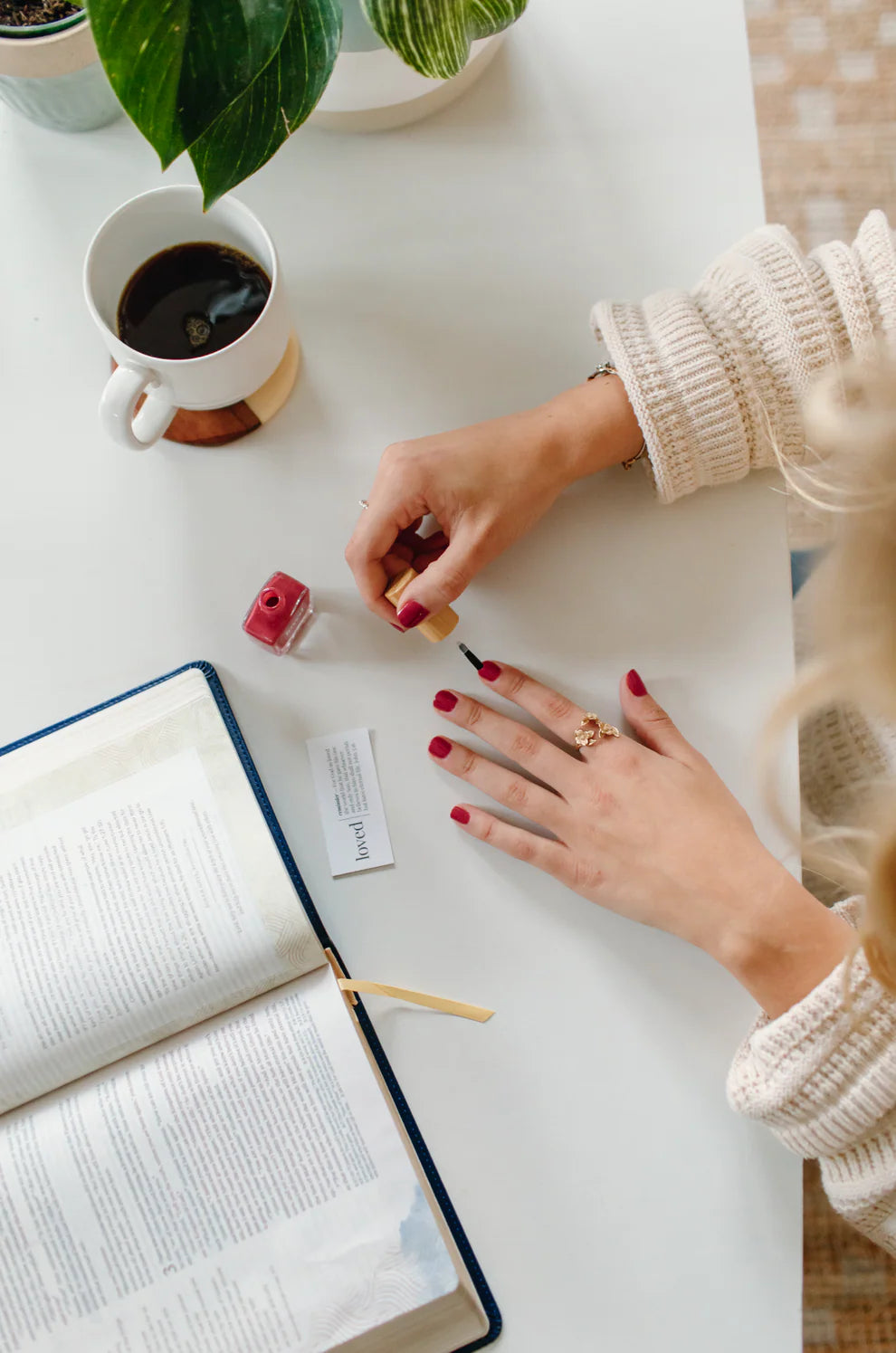 Applying ‘loved’ rose red reminder nail polish; available in 10ml, 15ml, and 20ml sizes.