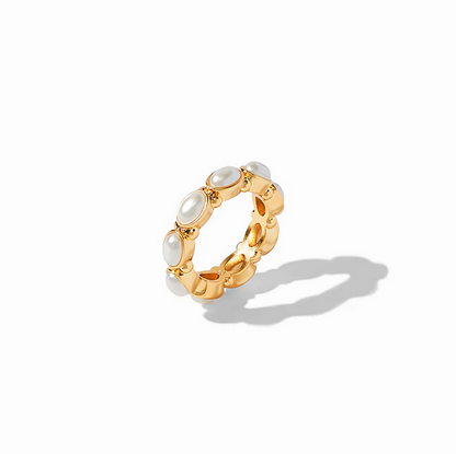 Gold band with evenly spaced oval imported glass stones. Available in sizes 6, 7, and 8.