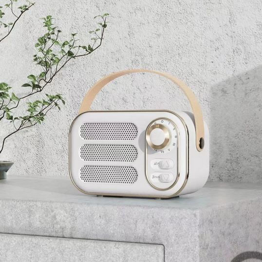 Vintage Bluetooth Speaker in white with tan handle, available in small, medium, and large sizes.