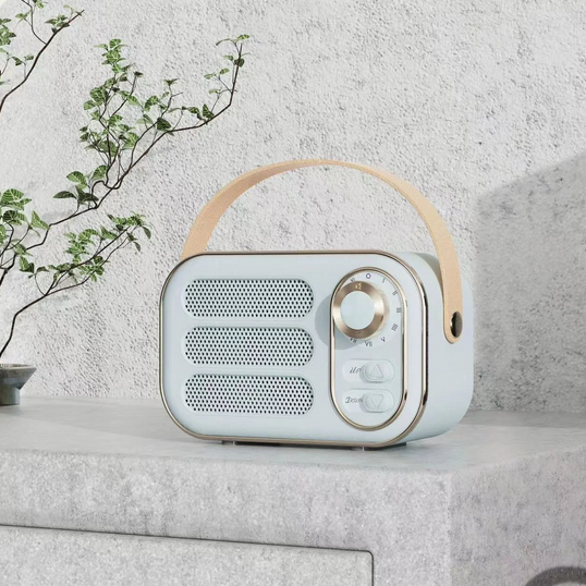Vintage Bluetooth Speaker in white with beige handle; available in small, medium, and large sizes.