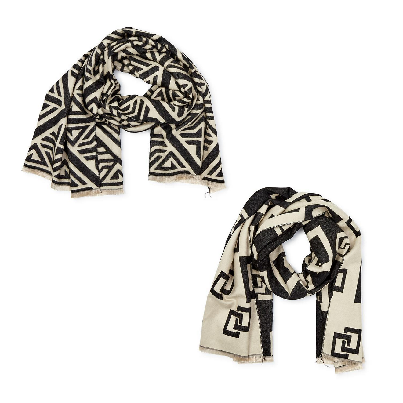 Two folded Sophisticated Lady Geometric Printed Super Soft Double Sided scarves on display. The scarf on the left showcases a repeating triangular design in black and white, while the scarf on the right features a pattern of black angular shapes on a white background. Both scarves are adorned with fringed edges. Available sizes: N/A.