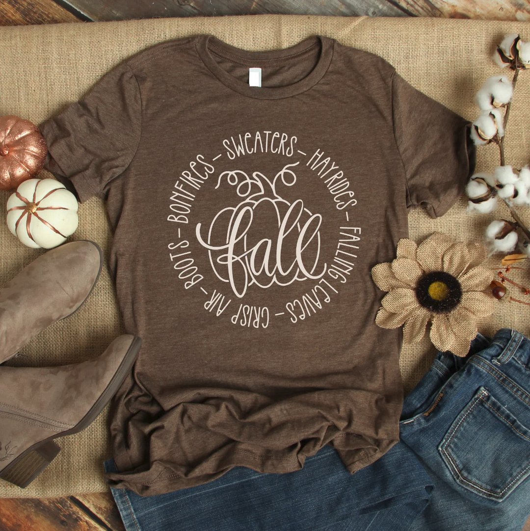 Brown “Fall Sweaters Hayrides” graphic tee; available in sizes S–XL.