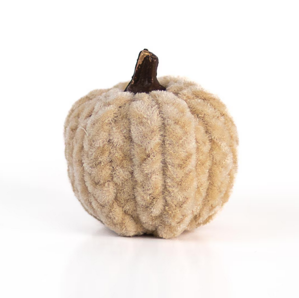 A small, plush Flocked Palmer & Scottie Pumpkin with a beige fuzzy texture, a dark brown stem, and ribbed surface mimicking natural pumpkin grooves. Ideal for cozy home decor or charming fall gifts. Size: Small only.