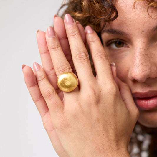 Hammered 24K gold-plated Solara Ring by Julie Vos, available in sizes 6–9.