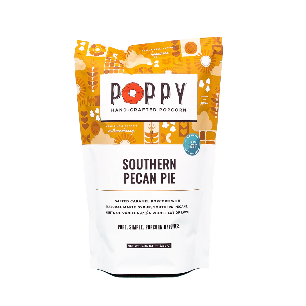 Southern Pecan Pie Poppy Popcorn is a delicious treat packed in a bag adorned with pecan and autumn leaves design on a white and gold background. Available sizes for this product are small, medium, and large.