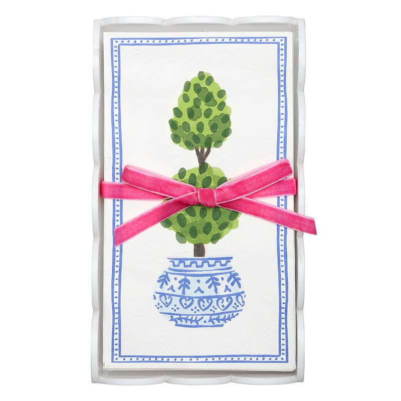 Acrylic Guest Napkin Tray + Napkins | Topiary includes a clear acrylic tray and guest napkins featuring a decorative card with a painted topiary in a blue patterned pot, bordered in blue with a pink velvet ribbon. Sizes: standard guest napkin dimensions; tray fits guest towels.