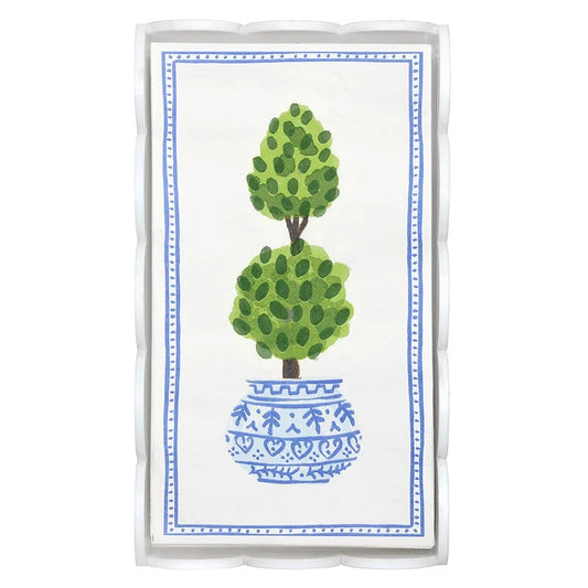 Acrylic Guest Napkin Tray with decorative napkins featuring scalloped edges, a watercolor green topiary in a blue and white pot, and a blue geometric border. Available in guest size.