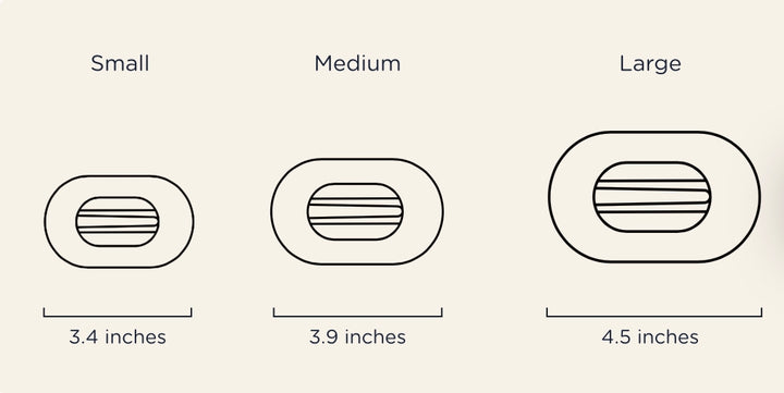 TELETIES Flat Round Hair Clips feature a design with horizontal lines and are crafted from innovative materials. Available sizes: Small (3.4-inch), Medium (3.9-inch), Large (4.5-inch).