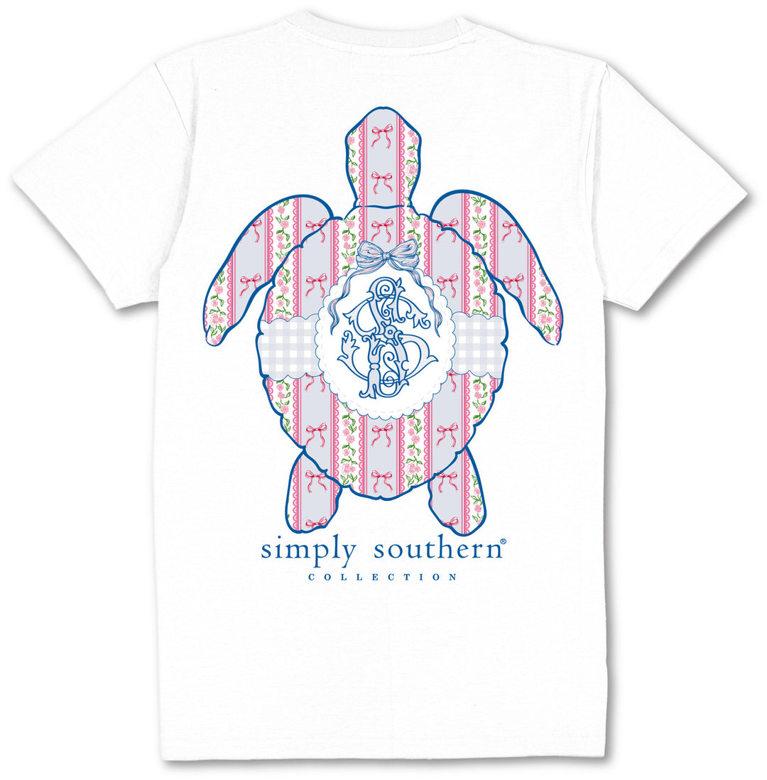 White Simply Southern Coquette Logo Turtle T-Shirt with pink/blue sea turtle graphic, monogram, text. Sizes: S-XXL.