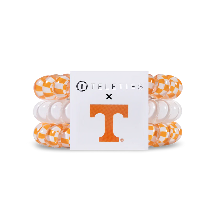 Set of 3 TELETIES hair ties: two orange-white checkered, one clear; includes card. Available in small and large sizes.