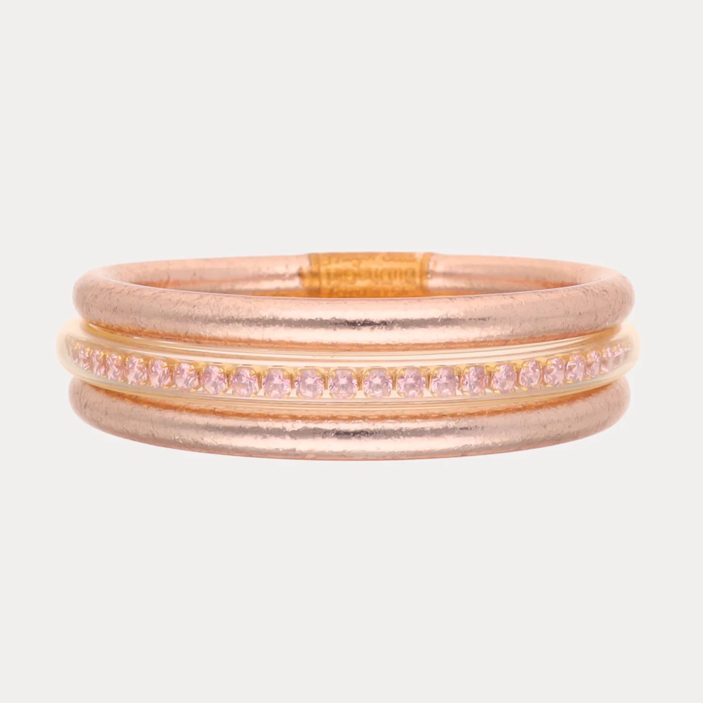 Rose gold ring with three parallel bands, pink gemstone center band, waterproof. Sizes available: 5-10.