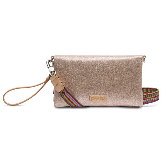 Emery Uptown Crossbody: Gold clutch with detachable strap, card holder slots, wristlet strap, leather tag, and front logo patch. Sizes: One size only.