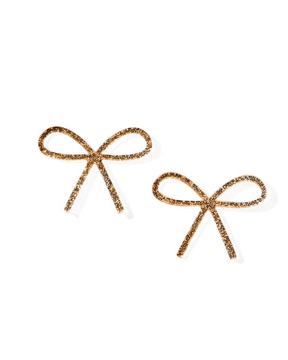 Gold glitter bow-shaped earrings made from eco-friendly acetate. Available Size: One size fits all.