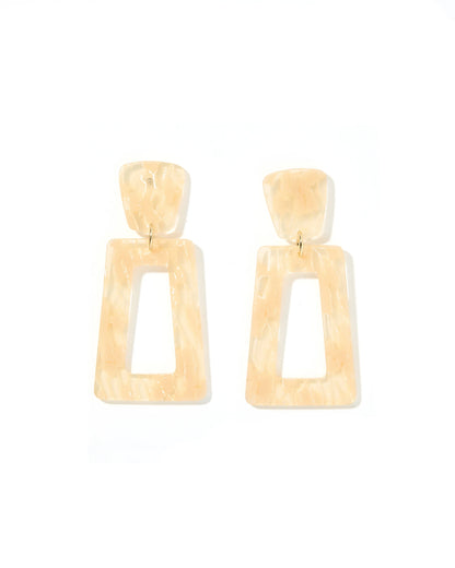 The Kennedy Earrings: Statement earrings with beige, marbled rectangle drops and smaller rectangular tops. Glossy finish with brass-tone connectors. Available in one size.