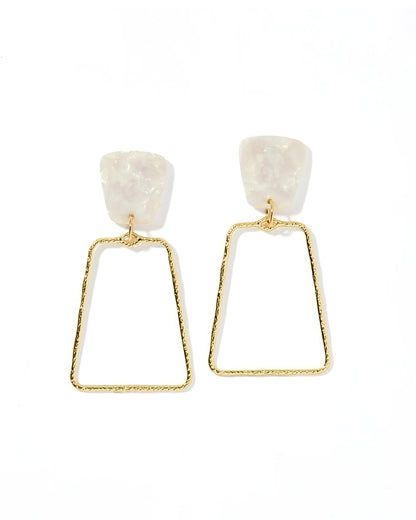 The Kaelyn Earrings feature gold-toned alloy with an abstract white stone top and open trapezoidal shapes below, crafted from textured, gold-plated material. Suitable for sensitive ears.