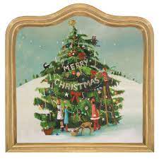Trim the Tree Placemats featuring a whimsical Janet Hill painting of a Christmas tree with a “Merry Christmas” banner and gold-toned border.