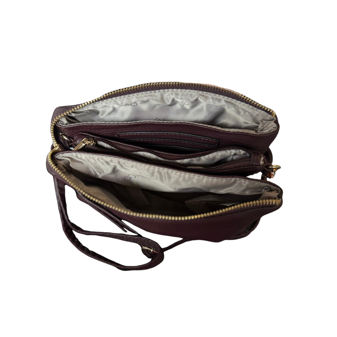 The Riley Crossbody Bag: small vegan leather, 2 zippered compartments, divider pocket, beige lining, detachable strap. Sizes: S, M.