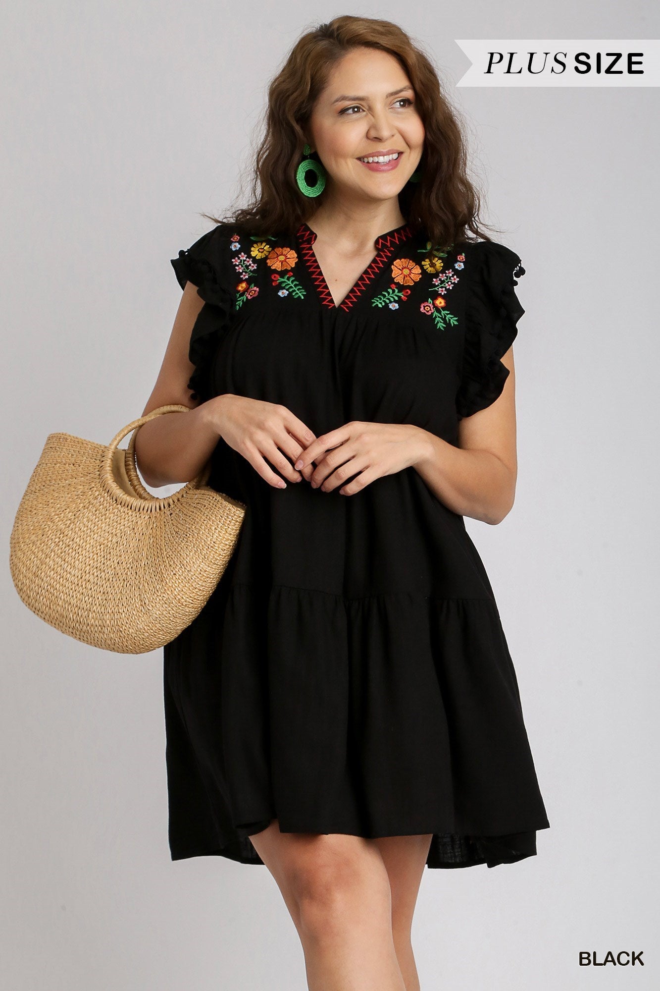 Linen Embroidered Short Dress features ruffle sleeves and pom pom details.