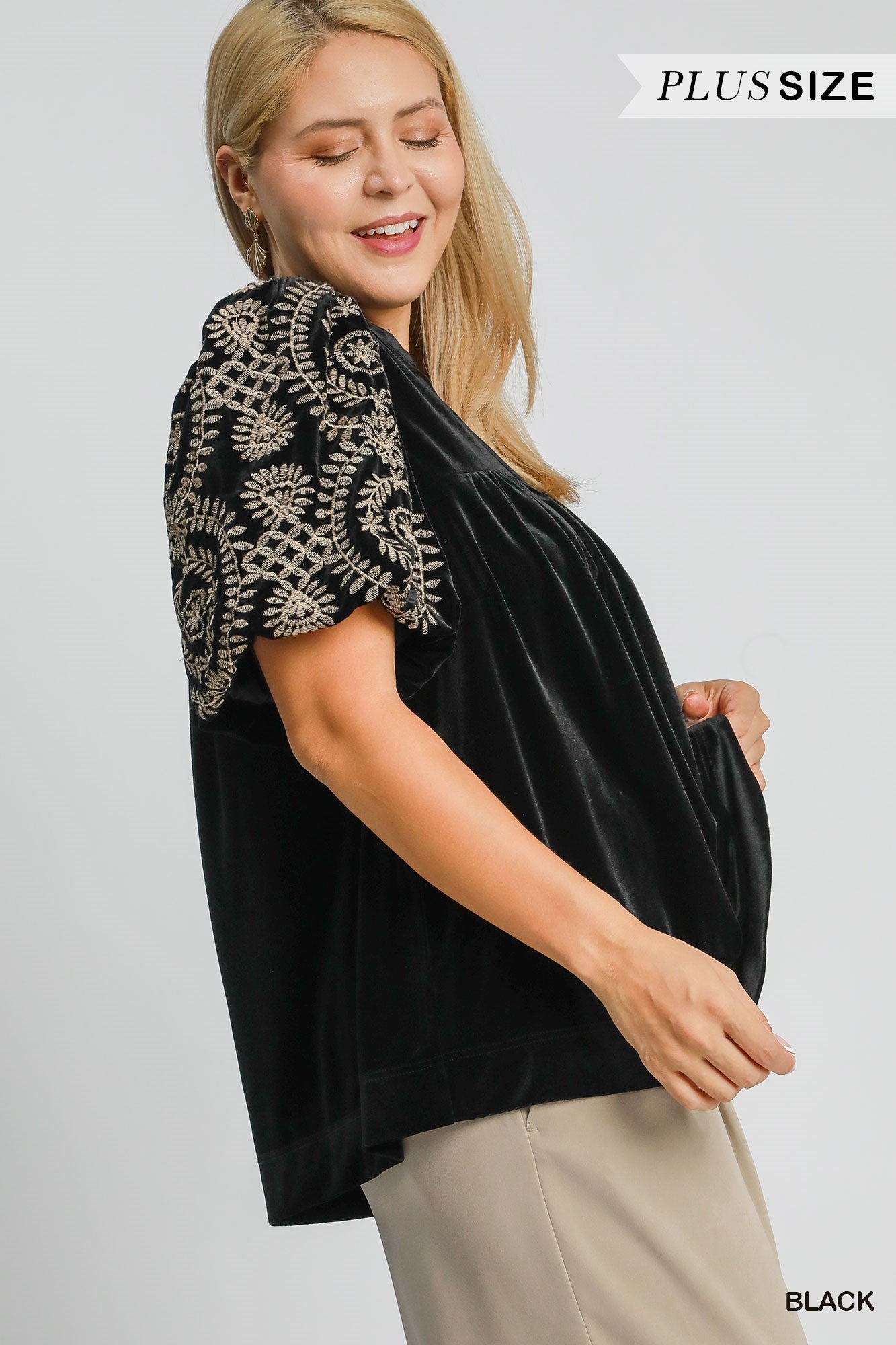 Velvet Embroidered Sleeve Top. Sizes: Plus Size. Color: Black. Boxy cut, bubble sleeves with detailed embroidery.